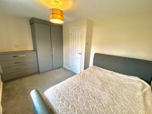 Bedroom One- click for photo gallery